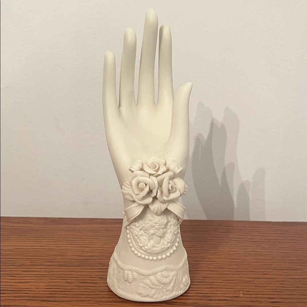 Elegant White Hand Sculpture with Floral Design